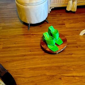 I am selling some beautiful green plat form shoes that can be worn many places